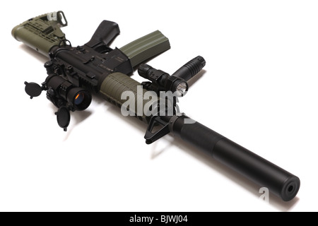 Modern weapon. US Spec Ops M4A1 custom rifle with red dot sight, silencer and tactical flashlight. Isolated on white background. Stock Photo