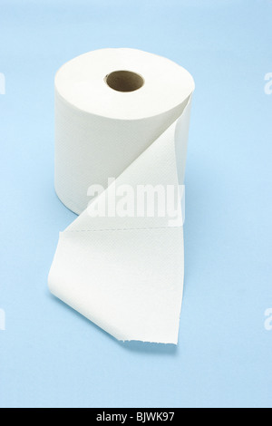 White toilet roll on seamless blue background Stock Photo