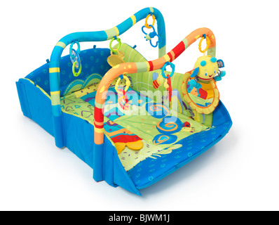 Colorful play mat with toys for babies. Isolated on white background. Stock Photo