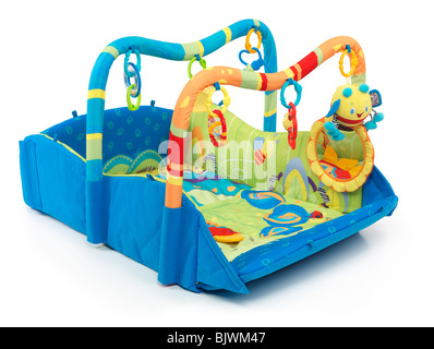 Colorful play mat with toys for babies. Isolated on white background. Stock Photo