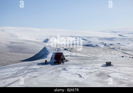 People in mountain cabin at Fimmvorduhals in glacier, Eyjafjallajokull, Iceland - Stock Photo