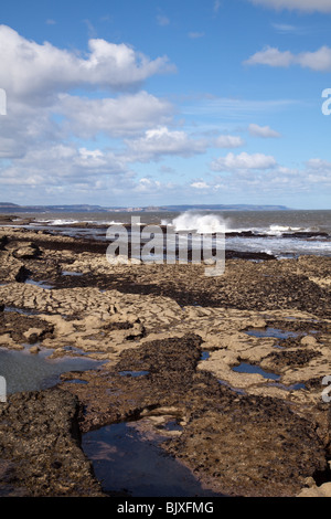 Filey Brigg natural rock promontory and beach from the Yorkshire Wolds ...