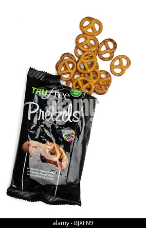 Bag of Trufree Pretzels spilling onto a white surface Stock Photo