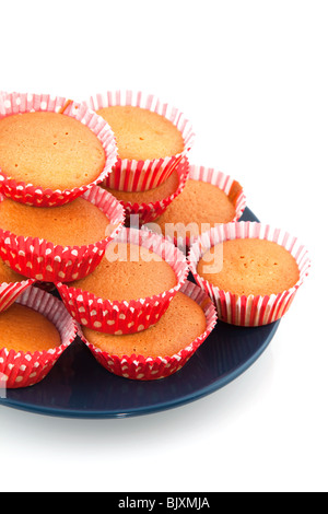 red spotted and striped cupcakes stacked over white Stock Photo