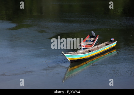 Two wooden fishing boats moored on the River Iglesias at Puerto Quimba, Darien, Panama Stock Photo