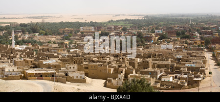 Panoramic shot of the view from the Desert Lodge looking down over El-Qasr at  Dakhla Oasis. Western Desert, Egypt Stock Photo