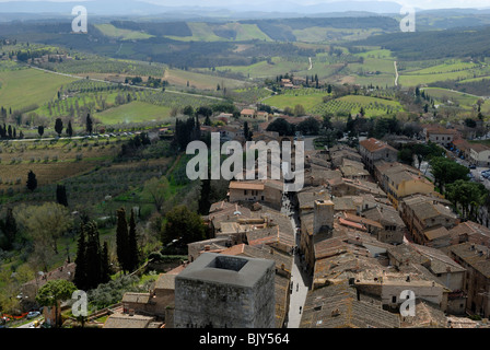 A spectacular view to the south of the roof tops of the Via San Giovanni and the surrounding countryside from the Torre Grossa. Stock Photo