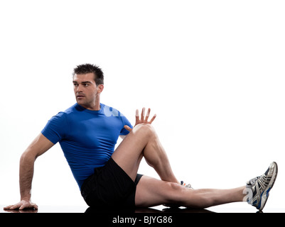 man on Abdominals rotation workout posture on white background Sit