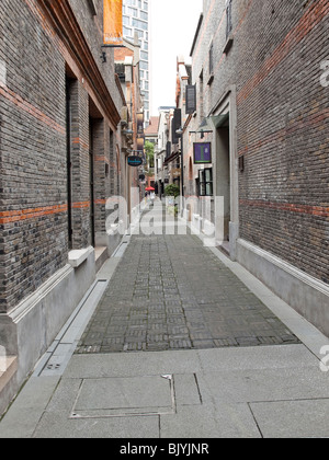 Narrow street in Xintiandi, Shanghai, China Stock Photo