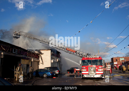 Aerial Platform operating at 2nd Alarm Fire Detroit Michigan USA by Dembinsky Photo Assoc Stock Photo