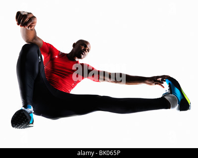 Male athlete stretching