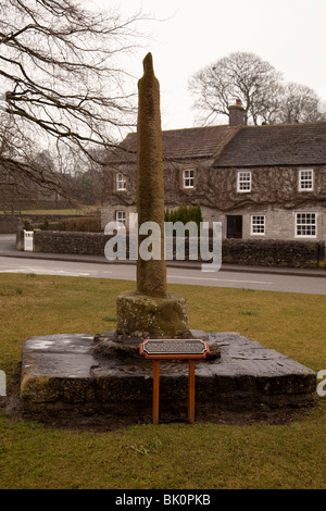 The village cross in Monyash, a small village situated at the head of Lathkill Dale in the Peak District in Derbyshire Stock Photo