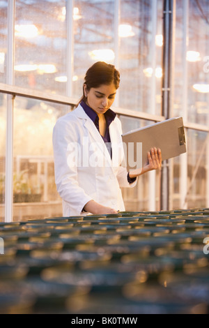 Indian scientist working in laboratory Stock Photo