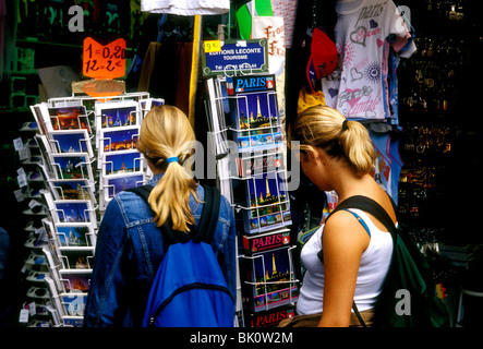 French people, young women, tourists, buying postcards, postcard rack, Place du Tertre, Montmartre District, Paris, Ile-de-France, France, Europe Stock Photo