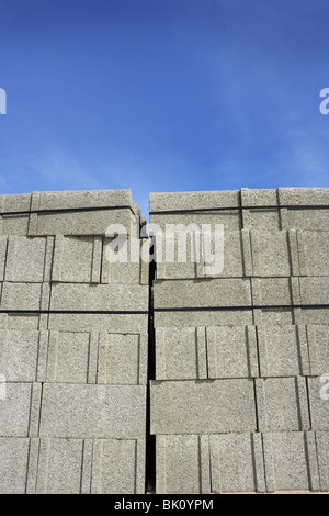 stacked construction block piles pattern Stock Photo