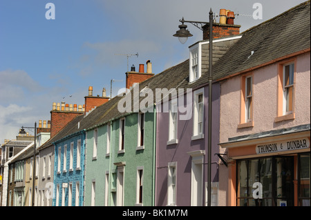 Pastel coloured terraced houses on Castle Street, Kirkcudbright, Dumfries and Galloway Stock Photo