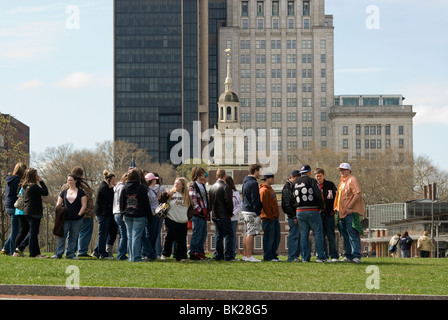 Teens agers on a tour gather on the mall in front of Independence Hall at Independence National Historical Park in Philadelphia Stock Photo