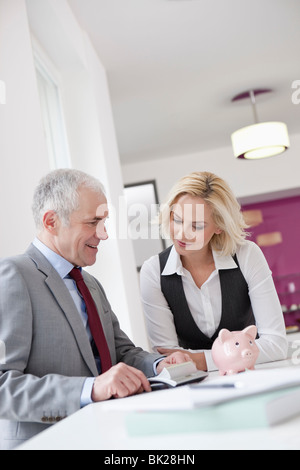 Man counseling young woman Stock Photo