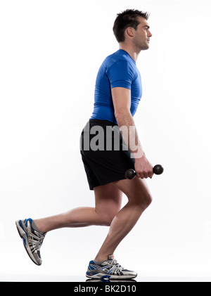 man doing workout squats weight training crouching on studio white isolated background Stock Photo