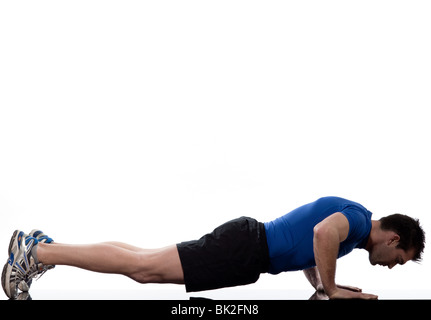 man doing push up abdominals workout posture on isolated white ...