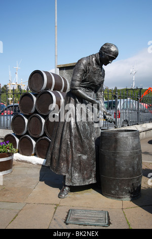 Herring Girl statue, Stornoway harbour, Isle of Lewis, Outer Hebrides, Scotland, 2009. Stock Photo