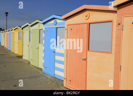 A row of colourful beach huts on Seaford Seafront, East Sussex, England. Stock Photo