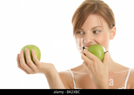 Young beauty woman with two green apples isolated on white background Stock Photo