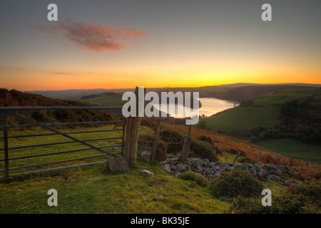 Sunset from Bryn-y-fan (Van Mountain) over Llyn Clywedog. Powys, Wales. Stock Photo