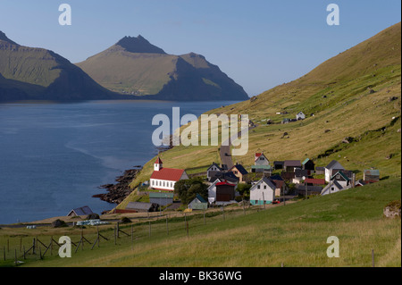 Village of Kunoy, located on the west coast of the island Kunoy, iNordoyar, Faroe Islands Stock Photo