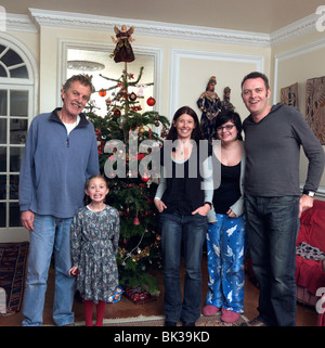 Family Group Four Generations At Christmas England Stock Photo