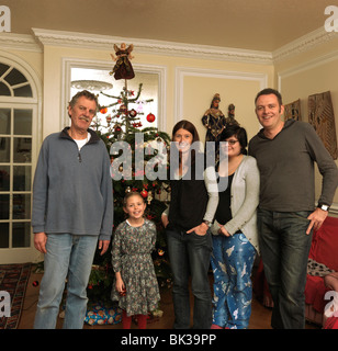 Family Group Four Generations At Christmas England Stock Photo