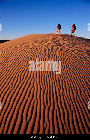 Hiking in the White Wash Dunes south of the town of Green River, Utah. Stock Photo