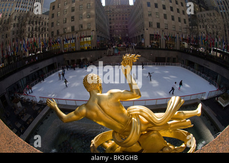 The statue of Prometheus watches over the Rockefeller Center ice skating rink in New York Stock Photo