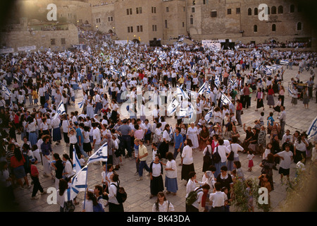 Israeli Flags at the Western Wall during the 6 Day War Anniversary Celebration, Jerusalem Stock Photo