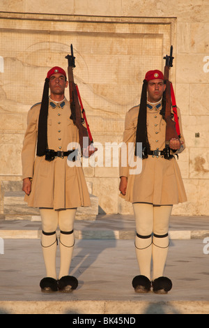 Evzones presidential guard standing at attention in summer service uniform at Greek Parliament in Athens Stock Photo