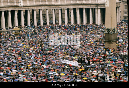 Crowd scene and Bernini's Colonnade in St. Peter's Square, Rome, Italy Stock Photo