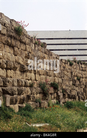 A preserved section of the Servian Wall (a 4th century BCE defensive barrier) next to the Termini railway station in Rome, Italy Stock Photo