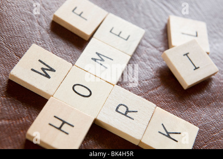 Wooden Tiles In Crossword Shape Spelling Words Home Work And Life To Illustrate Pressures Of Modern Life Stock Photo