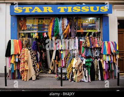 Exterior of colourful fabric shop front Stock Photo