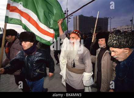 Chechen Dudayev supporters rally outside the 'Presidential Palace' in central Grozny, Chechnya. Stock Photo