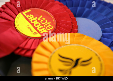 General Election UK Labour Liberal Democrats and Conservative party rosette Stock Photo