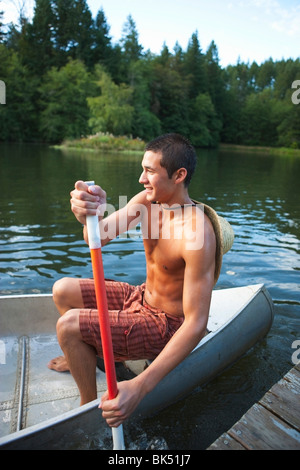 Teenage Boy Canoeing, Near Portland, Oregon, USA Stock Photo