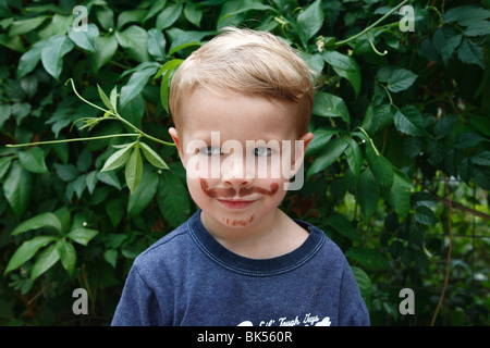 Portrait of Little Boy With Fake Moustache Stock Photo