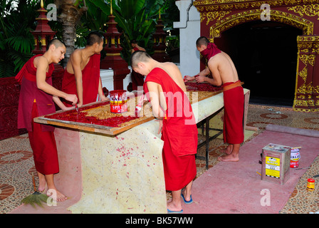 Young monk novice in a temple in Chiang Mai, Thailand, Southeast Asia Stock Photo