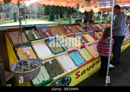 A stall on a French market in England selling handmade soaps Stock Photo