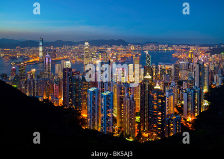 View over Hong Kong from Victoria Peak, the illuminated skyline of Central sits below The Peak, Victoria Peak, Hong Kong Stock Photo