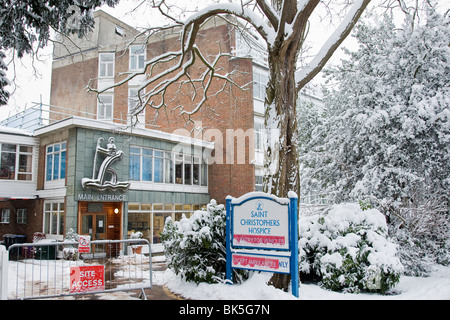 Front entrance of St Christophers Hospice in Sydenham covered in snow Stock Photo