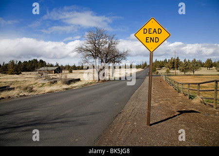 A dead end sign on a lonely country road or lane Stock Photo