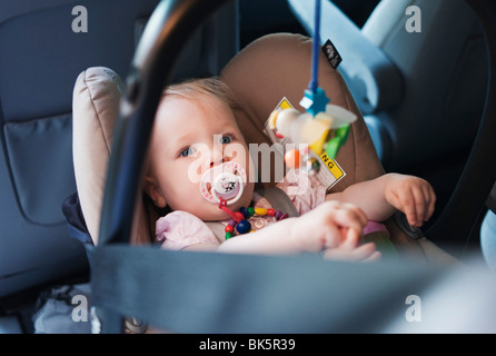 Baby Girl in Car Seat Stock Photo