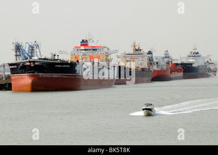 Bulk fuel carrier ships moored alongside Fawley Marine Terminal on Southampton Water southern England UK Stock Photo